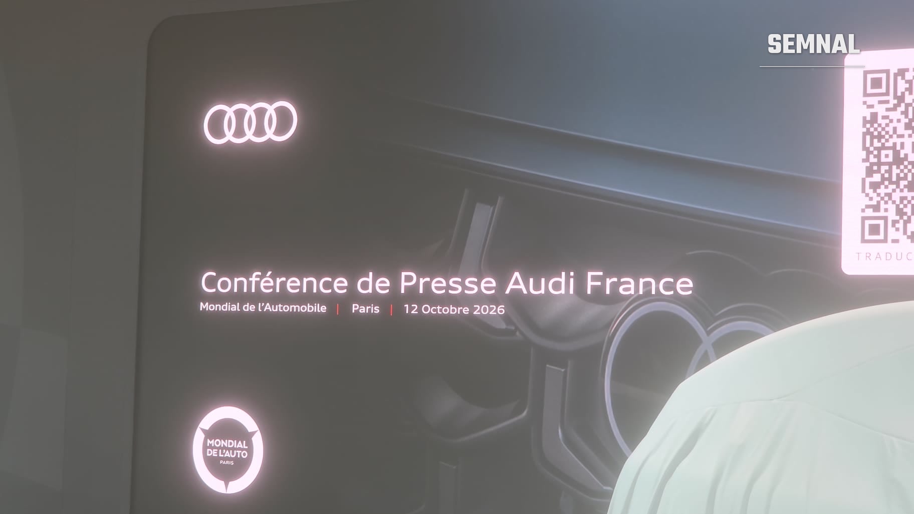 Ecranul conferinței de presă Audi France de la Salonul Auto de la Paris, din 12 octombrie 2026. Fotografie transmisă de Vasile Trofim, prezent la Salonul Auto de la Paris 2026